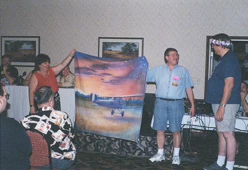 Barbara Walley & Keith W. Stokes present Dawn Patrol banner to Roger Tener